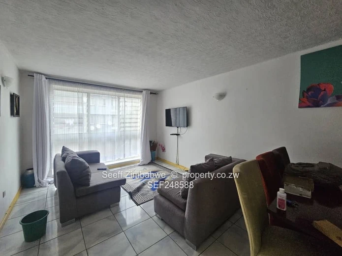 Sunlit 1-Bed Apartment in Avenues CBD - Borehole