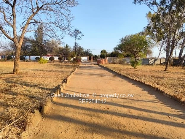Prime 2-Acre Development & Residential Investment Opportunity