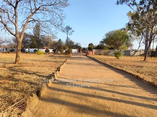 Prime 2-Acre Development & Residential Investment Opportunity